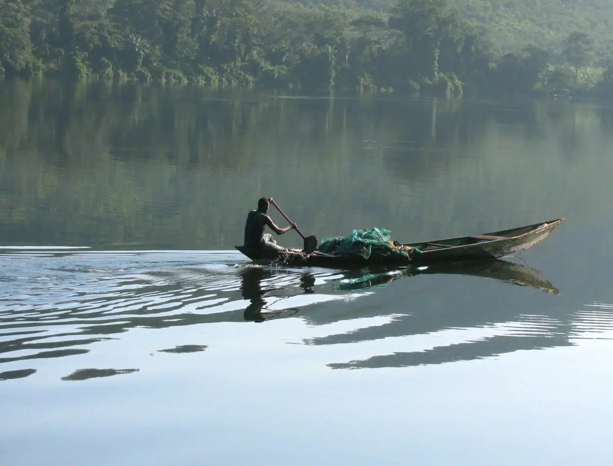 A canoe crossing still water