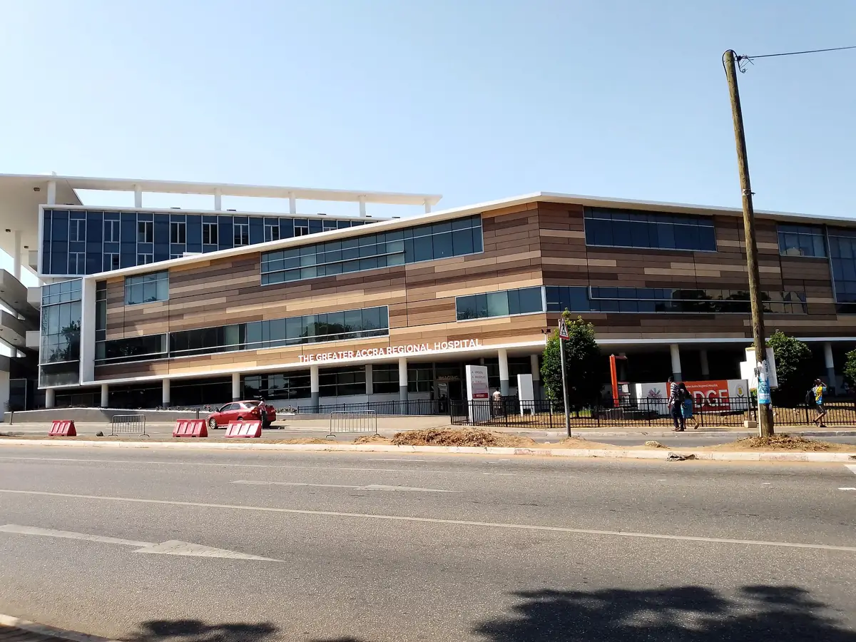 The signed entrance and exterior of Greater Accra Regional Hospital in Accra